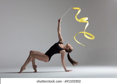 Young beautiful atglete is posing in studio - Powered by Shutterstock