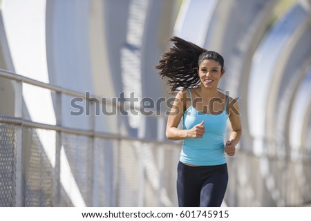 Similar – Black woman afro hairstyle running outdoors in urban road