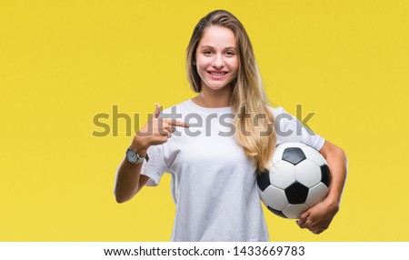 Similar – Image, Stock Photo Young blonde woman holding orange leaf