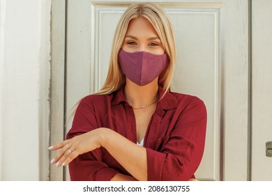 Young beautiful blonde woman in a mask - Powered by Shutterstock