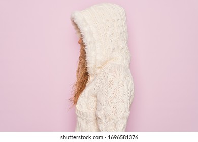 Young beautiful blonde woman wearing casual sweater with hood over isolated pink background looking to side, relax profile pose with natural face with confident smile. - Powered by Shutterstock