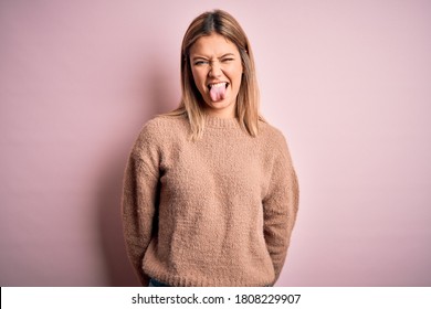 Out woman sticking tongue Senior woman