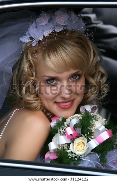 Young beautiful bride\
with blond hair