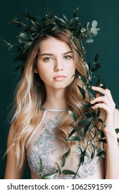 Young Beautiful Bride In Boudoir And Wedding Dress, With A Wreath And A Bouquet In Her Hands. London Wedding Trends, Stylish Photoshoot