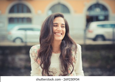 Young Beautiful Brunette Woman In The City