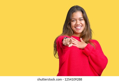Young beautiful brunette woman wearing red winter sweater over isolated background Laughing of you, pointing to the camera with finger hand over chest, shame expression - Shutterstock ID 1254109288