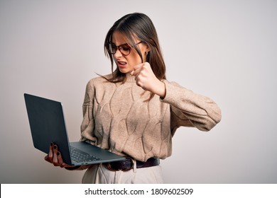 Young Beautiful Brunette Woman Working Using Laptop Over Isolated White Background Annoyed And Frustrated Shouting With Anger, Crazy And Yelling With Raised Hand, Anger Concept