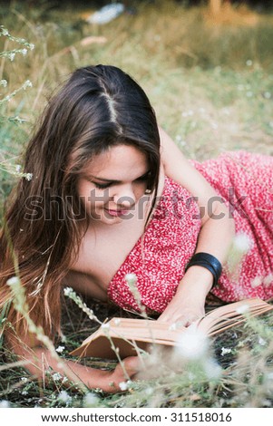 Similar – Image, Stock Photo Young redhead woman reading a red book