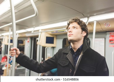 Young Beautiful Caucasian Man Commuter In The Subway - Commuting, Journey, Underground Concept