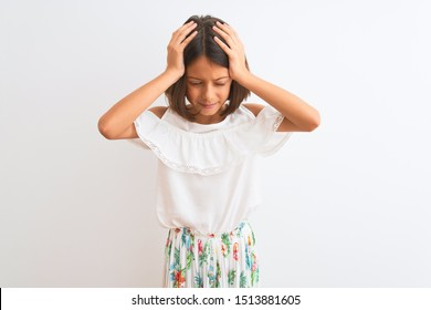 Young Beautiful Child Girl Wearing Casual Dress Standing Over Isolated White Background Suffering From Headache Desperate And Stressed Because Pain And Migraine. Hands On Head.