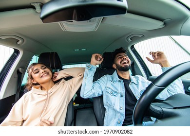 Young Beautiful Couple Dancing In The Car Under Dance Music