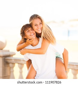 Young Beautiful Couple Enjoying A Summer Day Together