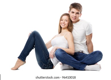 Young beautiful couple isolated on white background