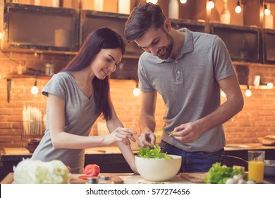 https://image.shutterstock.com/image-photo/young-beautiful-couple-kitchen-family-260nw-577274656.jpg