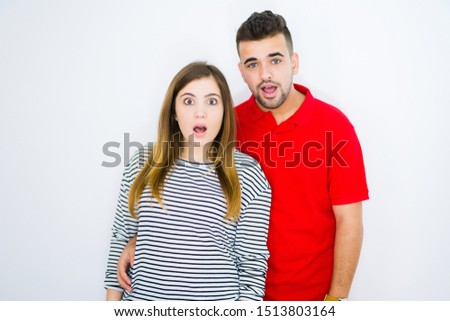 Similar – Young couple posing with funny faces