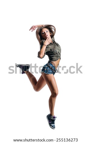 Similar – Young mixed woman with afro hair jumping outdoors.