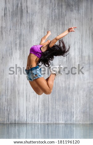 Similar – Unrecognizable women jumping over garden fence background