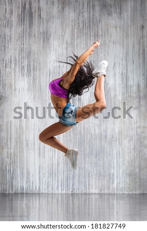 Similar – Unrecognizable women jumping over garden fence background