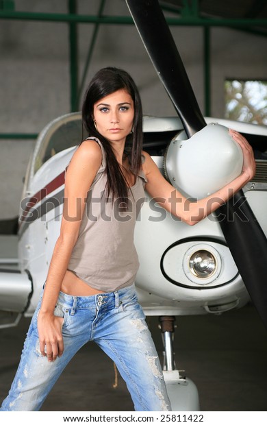 woman pose airplanes