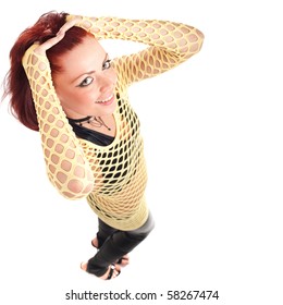 Young Beautiful Fashion Model With Red Hair And A Fishnet Shirt.