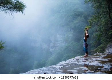 Young Beautiful Female Doing Yoga Pose Above Blue Mountains, Sydney Australia