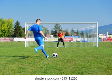 young and beautiful footballers train football - Shutterstock ID 353411210