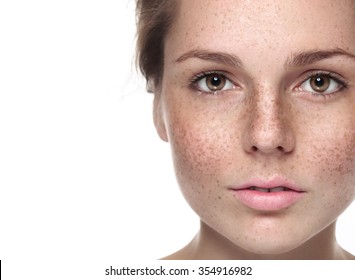 Young Beautiful Freckles Woman Face Portrait With Healthy Skin