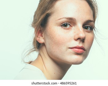 Young Beautiful Freckles Woman Face Portrait With Healthy Skin