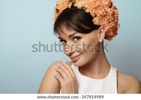Young beautiful girl in the flower crown
