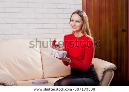 Young beautiful girl holding her engagement ring in excitement in Valentine day Stock photo © 