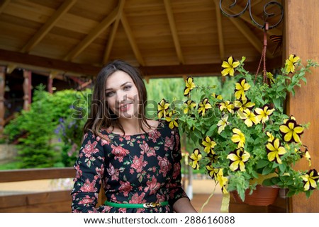 Similar – Young woman with closed eyes laughing over nature background