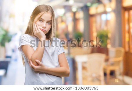 Young beautiful girl over isolated background thinking looking tired and bored with depression problems with crossed arms.