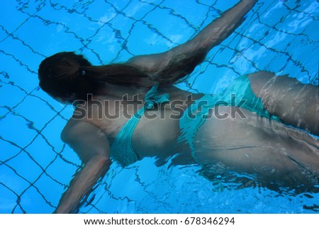 Similar – #A# Pool-Tag 1 Mensch