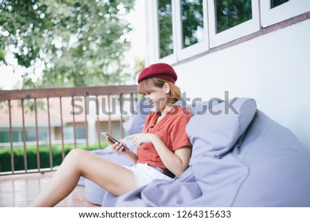 young beautiful girl using mobile phone
