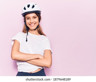 Young Beautiful Girl Wearing Bike Helmet Happy Face Smiling With Crossed Arms Looking At The Camera. Positive Person. 