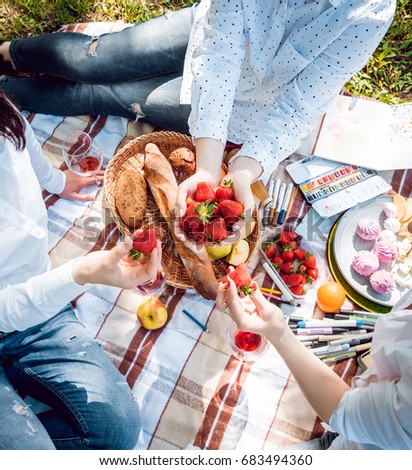 Similar – Freunde essen Kuchen und haben Spaß auf der Party.