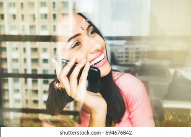 Young Beautiful Happy Indian Woman Talking On Phone