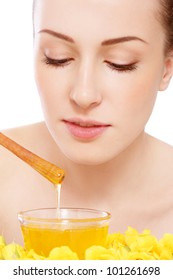 Young Beautiful Healthy Woman Making Honey Facial Mask