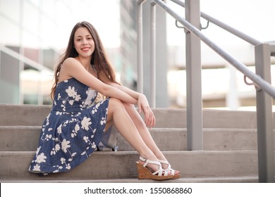 A Young Beautiful High School Senior Modern Portrait In Urban Background