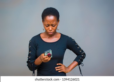 young beautiful lady angrily pressing her phone