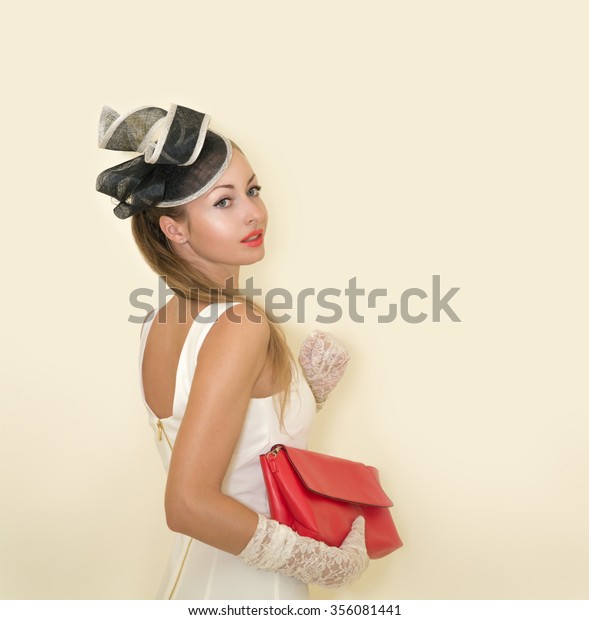 Young beautiful lady dressed in a proper outfit for\
horse racing in white dress with hat and gloves with red lipstick,\
fashion on the field