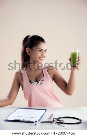 Similar – Image, Stock Photo Woman with sunglasses drinking green vegetable smoothie outdoors