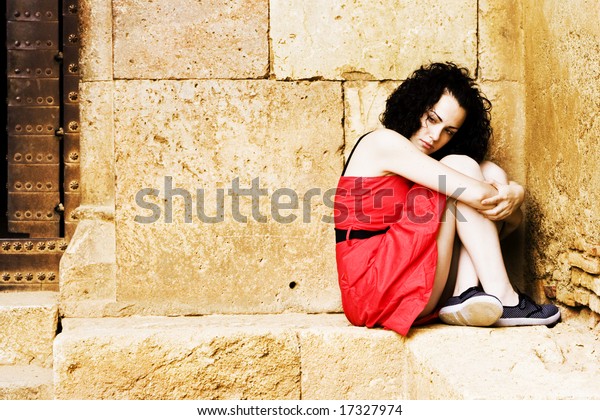 Young Beautiful Lone Woman On Red Stock Photo (Edit Now) 17327974