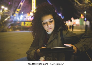 Young Beautiful Mixed Race Woman Outdoor Evening Using Tablet - Customer, Binge Watching, Screentime Concept