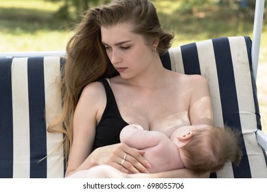 beautiful mother breastfeeding