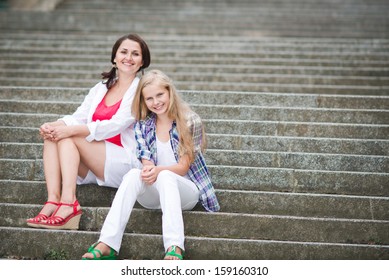 young beautiful mother with her daughter