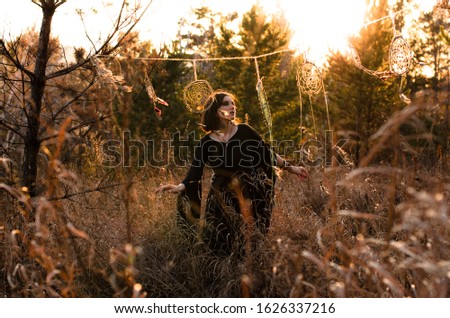 Similar – Image, Stock Photo Blonde girl with hat and hands in the head enjoying relaxed the nature in forest.