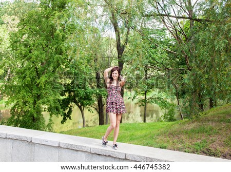 Similar – Beautiful young woman smiling and walking happy on the park outdoors