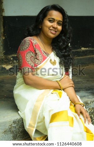 Young Beautiful Smiling Kerala Indian Girl Woman In Traditional Set Saree Kalamkari Blouse Young Beautiful Smiling Kerala Indian Girl Woman In Traditional Set Saree Kalamkari Blouse