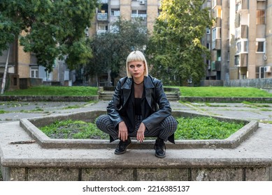 Young Beautiful Strong Independent Rebel Blonde Woman Punk Music And Style Fan Posing. Confident Punk-Rock Youth Culture Street Style Concept.	